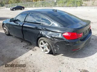 2015 BMW 4 Series 428i z VIN WBA4A9C58FGL85170, wystawiony jako IAAI lot #41362595 z przebiegiem 172 509 mil mil oraz . Historia ofert i sprzedaży dostępna na DreamBid. Obrazek 3.