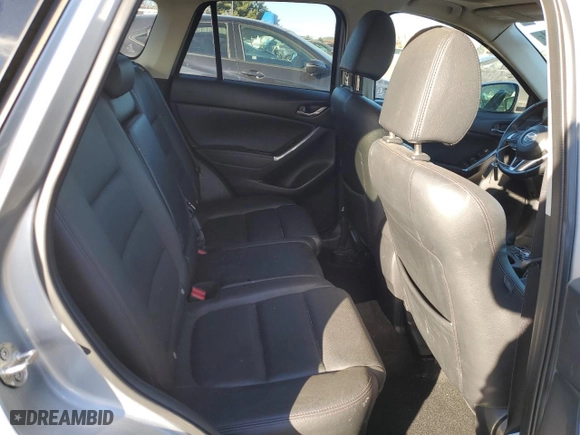 2016 Mazda CX-5 Grand Touring with VIN JM3KE4DYXG0713698, listed as a Copart auction lot 87176794 with 114,435 mi miles and Salvage Title. Bid and sale history available at carsss.com. Image 11.