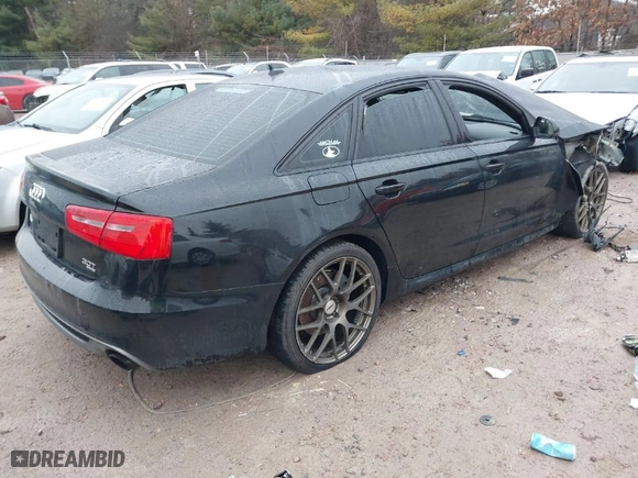 2014 Audi A6 3.0T Prestige with VIN WAUHGAFC7EN148367, listed as a IAAI auction lot 41084043 with 103,546 mi miles. Bid and sale history available at carsss.com. Image 4.