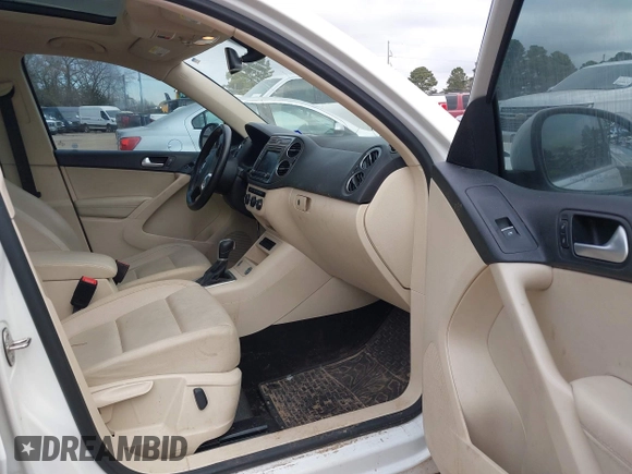 2017 Volkswagen Tiguan Wolfsburg Edition with VIN WVGRV7AX5HK019734, listed as a IAAI auction lot 41391911 with 123,005 mi miles and . Bid and sale history available at DreamBid. Image 5.
