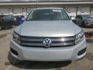 2013 Volkswagen Tiguan S z VIN WVGAV3AX2DW616476, wystawiony jako Copart lot #55313615 z przebiegiem 129 105 mil mil oraz Szkody całkowita. Historia ofert i sprzedaży dostępna na DreamBid. Obrazek 5.