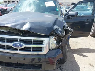2011 Ford Escape Limited with VIN 1FMCU0EG9BKC66966, listed as a IAAI auction lot 42627832 with 154,101 mi miles and . Bid and sale history available at DreamBid. Image 6.