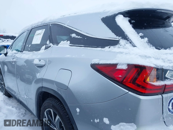 2018 Lexus RX 350L Premium z VIN JTJDZKCA9J2008933, wystawiony jako IAAI lot #41600527 z przebiegiem 93 423 mil mil oraz . Historia ofert i sprzedaży dostępna na DreamBid. Obrazek 14.