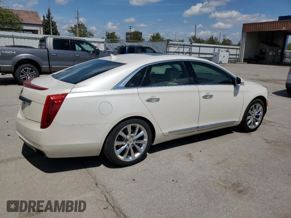 2014 Cadillac XTS Luxury z VIN 2G61M5S33E9193905, wystawiony jako Copart lot #55479605 z przebiegiem 143 006 mil mil oraz Szkoda całkowita • Salvage title. Historia ofert i sprzedaży dostępna na DreamBid. Obrazek 3.