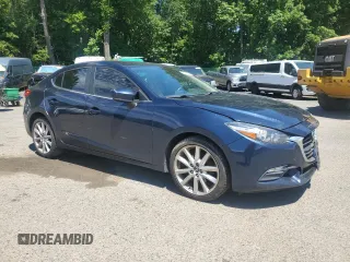 2017 Mazda 3 Touring with VIN JM1BN1V73H1125859, listed as a Copart auction lot 65023235 with 120,300 mi miles and Salvage title. Bid and sale history available at DreamBid. Image 4.