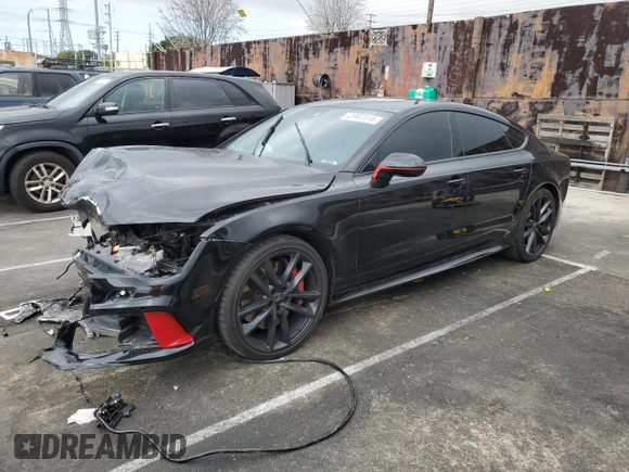 2016 Audi RS 7 Prestige z VIN WUAW2AFC4GN901559, wystawiony jako Copart lot #43982414 z przebiegiem 54 386 mil mil oraz . Historia ofert i sprzedaży dostępna na DreamBid. Obrazek 1.