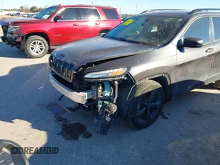 2016 Jeep Cherokee Sport with VIN 1C4PJLAS4GW329773, listed as a IAAI auction lot 41300023 with 101,912 mi miles and . Bid and sale history available at DreamBid. Image 18.