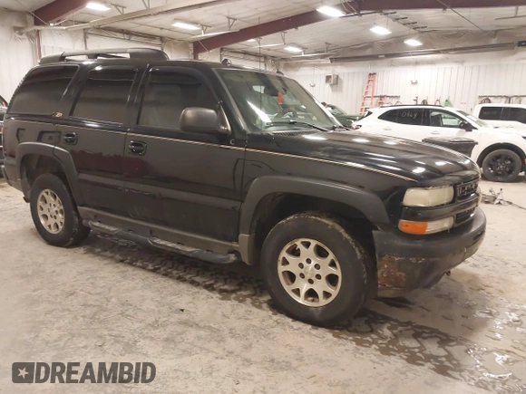 2004 Chevrolet Tahoe LS with VIN 1GNEK13T24R242907, listed as a IAAI auction lot 41496795 with 261,402 mi miles. Bid and sale history available at carsss.com. Image 1.