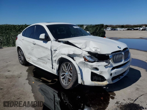 2015 BMW X4 xDrive35i with VIN 5UXXW5C54F0E87831, listed as a Copart auction lot 43763654 with 86,297 mi miles. Bid and sale history available at carsss.com. Image 4.