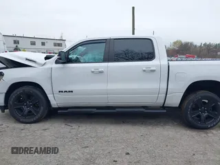 2021 Ram 1500 Big Horn with VIN 1C6SRFFT1MN721561, listed as a IAAI auction lot 42017023 with 62,023 mi miles and . Bid and sale history available at DreamBid. Image 14.