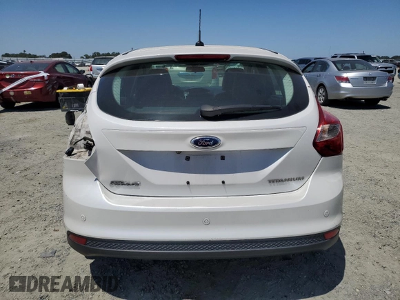 2014 Ford Focus Titanium with VIN 1FADP3N2XEL423320, listed as a Copart auction lot 58709875 with 93,011 mi miles and Salvage title. Bid and sale history available at DreamBid. Image 6.