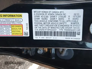 2023 Honda Civic EX with VIN 2HGFE1F73PH320247, listed as a IAAI auction lot 42148175 with 40,454 mi miles and . Bid and sale history available at DreamBid. Image 9.