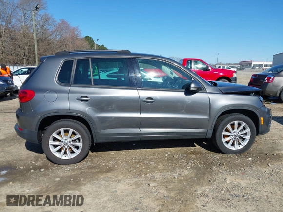 2014 Volkswagen Tiguan SE z VIN WVGAV3AX0EW511694, wystawiony jako IAAI lot #41811345 z przebiegiem 95 129 mil mil oraz . Historia ofert i sprzedaży dostępna na DreamBid. Obrazek 13.