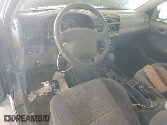 2001 Isuzu Rodeo S with VIN 4S2CK58W614344850, listed as a Copart auction lot 63807664 with 176,203 mi miles and Salvage title. Bid and sale history available at DreamBid. Image 8.