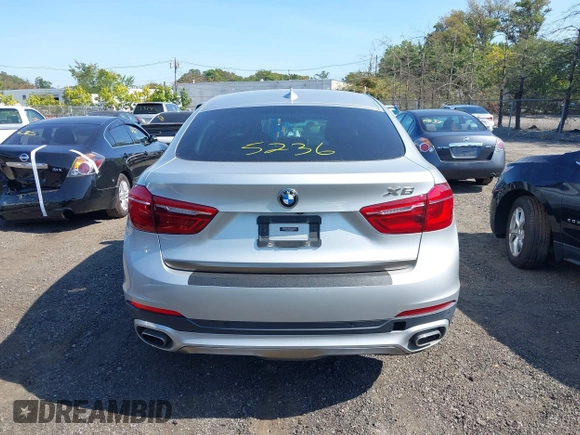 2018 BMW X6 xDrive35i z VIN 5UXKU2C51J0X50507, wystawiony jako IAAI lot #40275236 z przebiegiem 67 523 mil mil oraz . Historia ofert i sprzedaży dostępna na DreamBid. Obrazek 16.