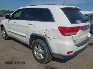 2012 Jeep Grand Cherokee Laredo with VIN 1C4RJFAG2CC176313, listed as a IAAI auction lot 42098127 with 162,556 mi miles. Bid and sale history available at carsss.com. Image 6.