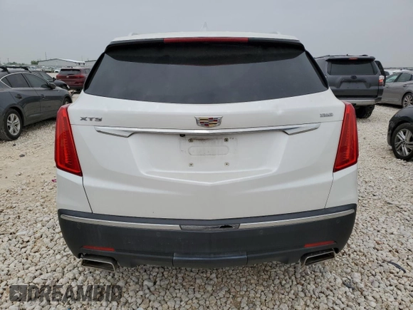 2017 Cadillac XT5 FWD with VIN 1GYKNARS0HZ314818, listed as a Copart auction lot 51158785 with 87,091 mi miles and Clean title. Bid and sale history available at DreamBid. Image 6.