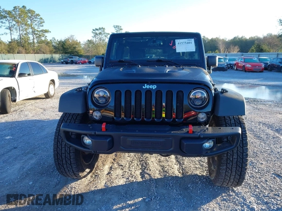 2015 Jeep Wrangler Unlimited Rubicon with VIN 1C4BJWFGXFL610153, listed as a IAAI auction lot 41575401 with 114,583 mi miles. Bid and sale history available at carsss.com. Image 12.