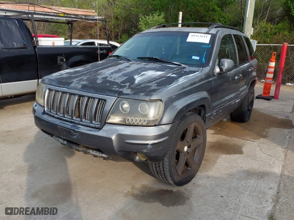 2004 Jeep Grand Cherokee Laredo with VIN 1J4GX48S14C218695, listed as a IAAI auction lot 41933611 with 158,290 mi miles. Bid and sale history available at carsss.com. Image 2.