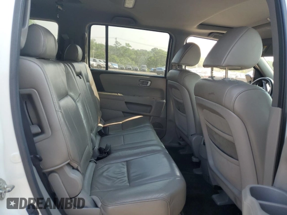 2011 Honda Pilot EX-L z VIN 5FNYF4H54BB031703, wystawiony jako Copart lot #60595295 z przebiegiem Nie podano mil oraz Czysty tytuł • Clean title. Historia ofert i sprzedaży dostępna na DreamBid. Obrazek 11.