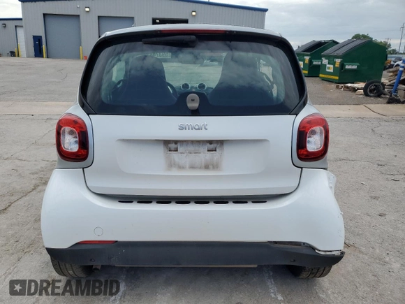 2016 Smart fortwo Passion with VIN WMEFJ5DAXGK084125, listed as a Copart auction lot 59374855 with 63,826 mi miles and Salvage title. Bid and sale history available at DreamBid. Image 6.