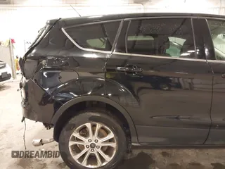 2017 Ford Escape SE with VIN 1FMCU9G94HUE08060, listed as a IAAI auction lot 41856229 with 187,838 mi miles and . Bid and sale history available at carsss.com. Image 21.