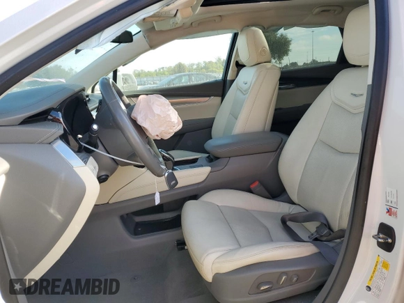 2018 Cadillac XT5 Luxury FWD with VIN 1GYKNCRS8JZ182473, listed as a Copart auction lot 60338405 with 76,595 mi miles and Salvage title. Bid and sale history available at DreamBid. Image 7.