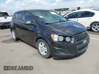 2014 Chevrolet Sonic LT with VIN 1G1JC6SHXE4135948, listed as a IAAI auction lot 41949833 with 127,202 mi miles. Bid and sale history available at carsss.com. Image 1.