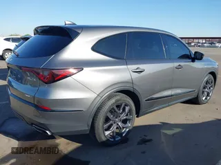 2023 Acura MDX w/A-Spec Package with VIN 5J8YE1H05PL033410, listed as a IAAI auction lot 42604907 with 35,806 mi miles and . Bid and sale history available at DreamBid. Image 4.