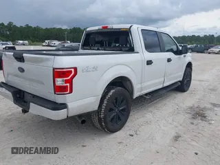 2020 Ford F-150 XL z VIN 1FTEW1EP3LFA05453, wystawiony jako IAAI lot #42644402 z przebiegiem 163 933 mil mil oraz . Historia ofert i sprzedaży dostępna na DreamBid. Obrazek 4.