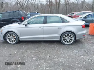 2015 Audi A3 z VIN WAUEFHFF9F1030113, wystawiony jako IAAI lot #41953949 z przebiegiem 98 755 mil mil oraz . Historia ofert i sprzedaży dostępna na DreamBid. Obrazek 14.