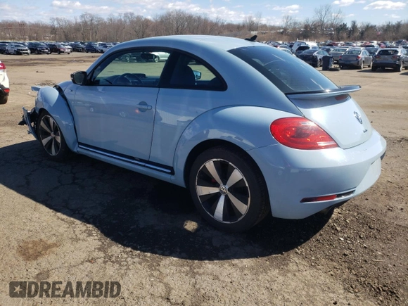 2014 Volkswagen Beetle Turbo R-Line with VIN 3VWVT7AT1EM639374, listed as a Copart auction lot 50230785 with 54,818 mi miles and Salvage Title. Bid and sale history available at DreamBid. Image 2.