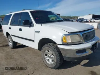1999 Ford Expedition XLT z VIN 1FMPU18L0XLB52467, wystawiony jako IAAI lot #42018037 z przebiegiem 288 327 mil mil oraz . Historia ofert i sprzedaży dostępna na DreamBid. Obrazek 1.