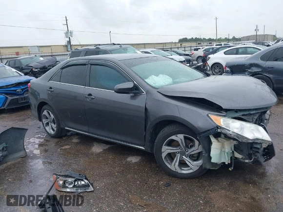 2014 Toyota Camry L with VIN 4T4BF1FK9ER443450, listed as a IAAI auction lot 41889283 with 205,020 mi miles. Bid and sale history available at carsss.com. Image 1.