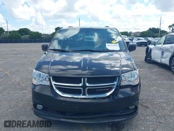 2019 Dodge Grand Caravan SXT with VIN 2C4RDGCG5KR797853, listed as a IAAI auction lot 40332854 with 81,197 mi miles and . Bid and sale history available at DreamBid. Image 6.