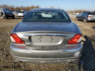 2002 Jaguar X-Type with VIN SAJEA51CX2WC59639, listed as a Copart auction lot 81078514 with 99,183 mi miles and Salvage Title. Bid and sale history available at carsss.com. Image 6.