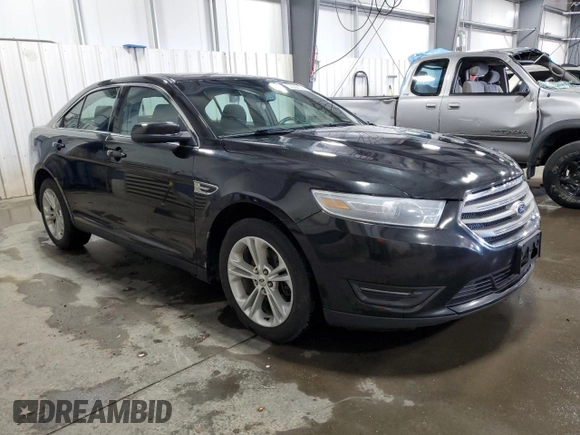 2014 Ford Taurus SEL with VIN 1FAHP2E86EG144150, listed as a Copart auction lot 50002145 with 183,526 mi miles and Salvage Title. Bid and sale history available at carsss.com. Image 4.