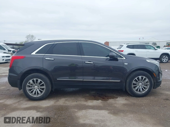 2017 Cadillac XT5 Luxury AWD z VIN 1GYKNDRS9HZ184992, wystawiony jako IAAI lot #41958484 z przebiegiem 124 941 mil mil oraz . Historia ofert i sprzedaży dostępna na DreamBid. Obrazek 13.