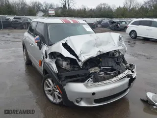2013 MINI Cooper Countryman with VIN WMWZB3C5XDWR35844, listed as a IAAI auction lot 41203877 with 118,000 mi miles. Bid and sale history available at carsss.com. Image 1.