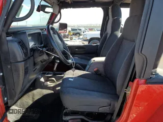 2003 Jeep Wrangler Rubicon z VIN 1J4FA69S93P352899, wystawiony jako Copart lot #56054425 z przebiegiem 3761 mil mil oraz Szkoda całkowita • Salvage title. Historia ofert i sprzedaży dostępna na DreamBid. Obrazek 7.