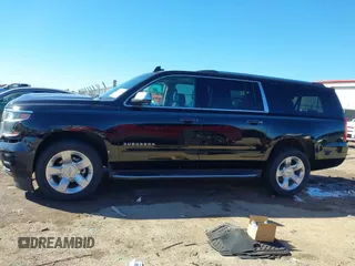2018 Chevrolet Suburban Premier z VIN 1GNSCJKC5JR386545, wystawiony jako IAAI lot #41684349 z przebiegiem 130 511 mil mil oraz . Historia ofert i sprzedaży dostępna na DreamBid. Obrazek 14.