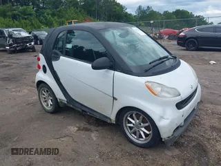 2008 Smart fortwo Pure z VIN WMEEJ31X78K128768, wystawiony jako IAAI lot #42367188 z przebiegiem 108 111 mil mil oraz . Historia ofert i sprzedaży dostępna na DreamBid. Obrazek 1.