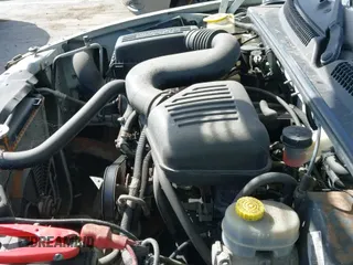 1999 Dodge Dakota z VIN 1B7FL22P0XS288012, wystawiony jako IAAI lot #41695852 z przebiegiem 150 431 mil mil oraz . Historia ofert i sprzedaży dostępna na DreamBid. Obrazek 12.