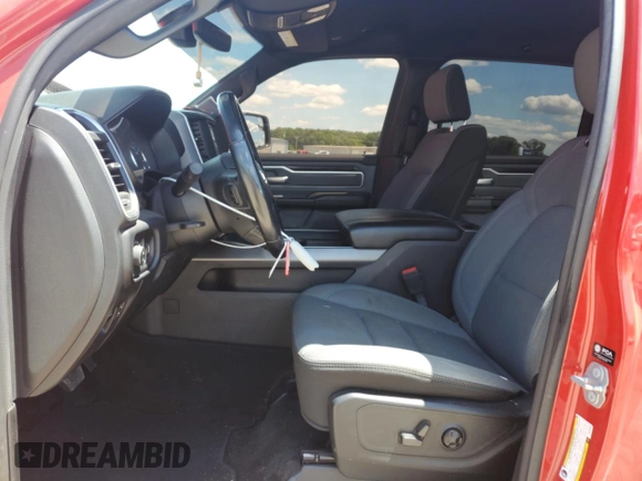 2021 Ram 1500 Lone Star with VIN 1C6RREFTXMN630958, listed as a Copart auction lot 55039995 with 53,497 mi miles and Salvage title. Bid and sale history available at DreamBid. Image 7.