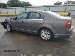 2012 Ford Fusion Hybrid z VIN 3FADP0L33CR211609, wystawiony jako Copart lot #60873005 z przebiegiem 144 474 mil mil oraz Szkoda całkowita • Salvage title. Historia ofert i sprzedaży dostępna na DreamBid. Obrazek 2.