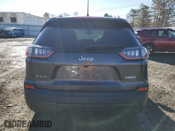 2019 Jeep Cherokee Latitude Plus with VIN 1C4PJMLB1KD487138, listed as a Copart auction lot 49325375 with 61,823 mi miles and Non repairable. Bid and sale history available at DreamBid. Image 6.