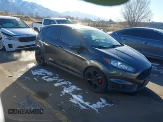 2016 Ford Fiesta ST with VIN 3FADP4GXXGM105374, listed as a IAAI auction lot 41367916 with 72,568 mi miles. Bid and sale history available at carsss.com. Image 1.
