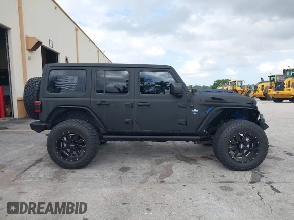2018 Jeep Wrangler Unlimited Sport S z VIN 1C4HJXDG2JW228483, wystawiony jako IAAI lot #41710364 z przebiegiem 56 970 mil mil oraz . Historia ofert i sprzedaży dostępna na DreamBid. Obrazek 13.