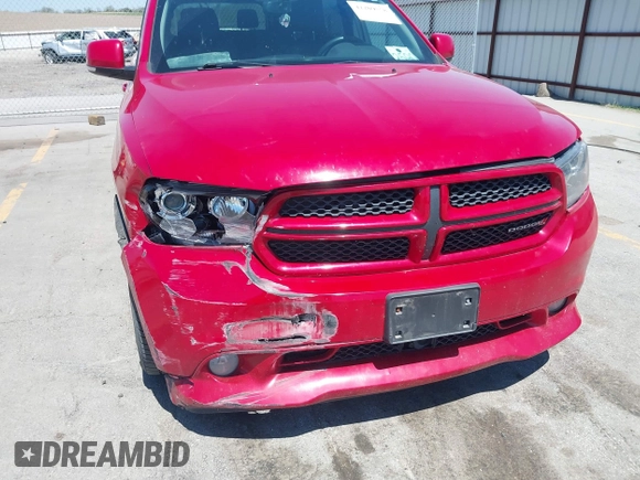2013 Dodge Durango R/T with VIN 1C4SDJCTXDC697240, listed as a IAAI auction lot 42209558 with 130,735 mi miles and . Bid and sale history available at DreamBid. Image 6.