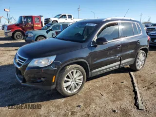 2011 Volkswagen Tiguan SE with VIN WVGBV7AX7BW516382, listed as a Copart auction lot 79992174 with 127,591 mi miles and Clean title. Bid and sale history available at DreamBid. Image 1.